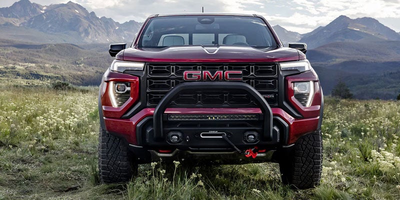 2026 GMC Canyon Elevation front view with off-road bumper and LED headlights